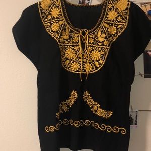 Mexican embroidered shirt.